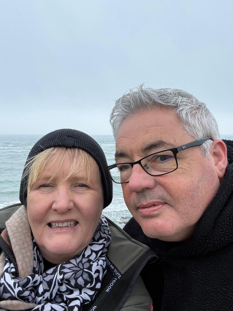 Denis and Lotte, co-founders of We Love Noni Global, by the sea in Ireland